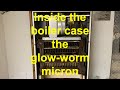 GLOW-WORM MICRON 100FF, inside the boiler casing carrying out a full strip down of the boiler.