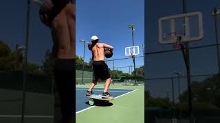 Guy Makes Basketball Trickshots While Balancing Himself on Rola-Bola - 1432685-3