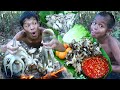 Primitive technology - Octopus cooking on a rock for food eat - Eating show