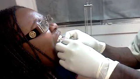Dontrice getting a tongue ring