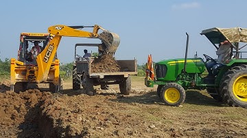 JCB Backhoe Machine Cutting Mud & Lading On JOHN DEERE 5050 D Tr-JCB Working For Road Constructions-