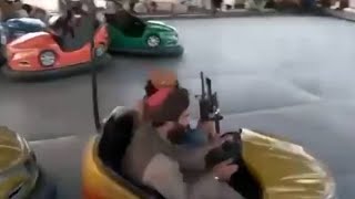 Afghanistan | Taliban fighters play on dodgem cars at amusement park in Kabul