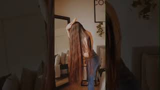 Girl Brushing Her Long Beautiful Hairs