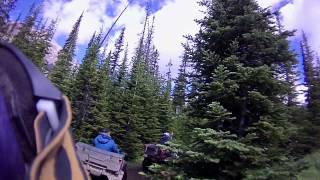 Honda Foreman on narrow mountain ATV trail.avi