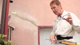 Repair cracks with Sikaflex caulking by adding sand.