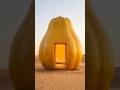 Building a luxury home inside a giant papaya! 🏠🍈✨ #diy #tinyhouse #desert #surreal #architecture
