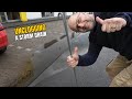 #067-1 Unclogging a storm drain on a parking space after rain in Germany thumbnail
