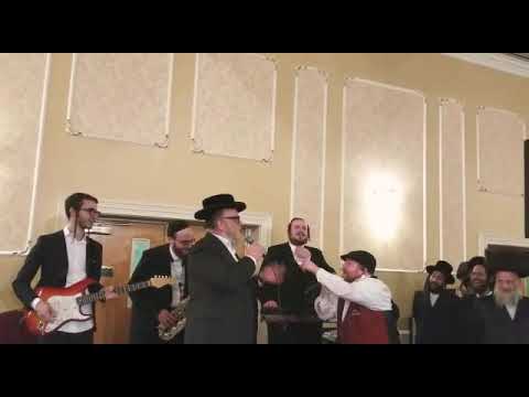 Michoel schnitzler and rafi the king rocking at a wedding in Monsey!