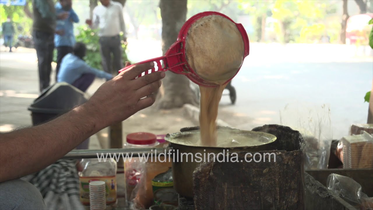 Roadside tea shops or Chaiwala during Covid Pandemic - Making 'Garam Chai' with masks on