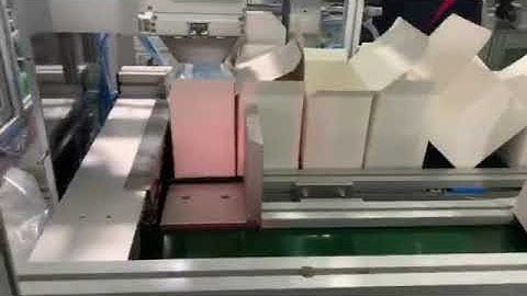 Automatic tie up mask machine with box packer