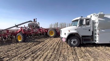 Filling Fertilizer, Seed and Fuel on Bourgault Air Drill and 91300 Cart