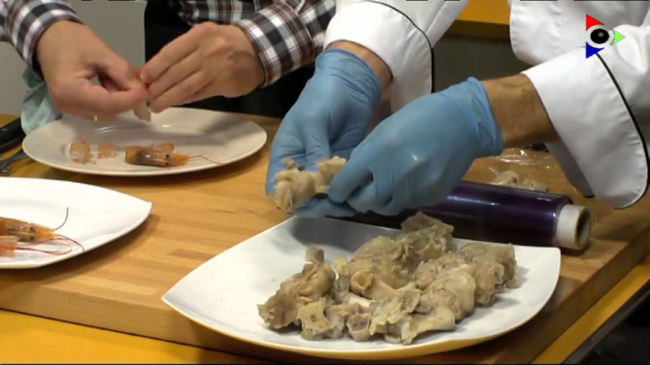 Peus de porc sense feina amb cargols i gambes