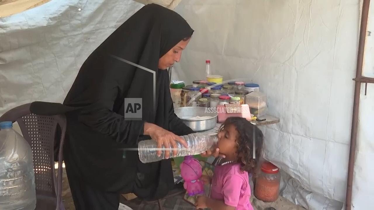 Conditions worsen as people in Gaza face heatwave amid struggle to secure water for drinking and san