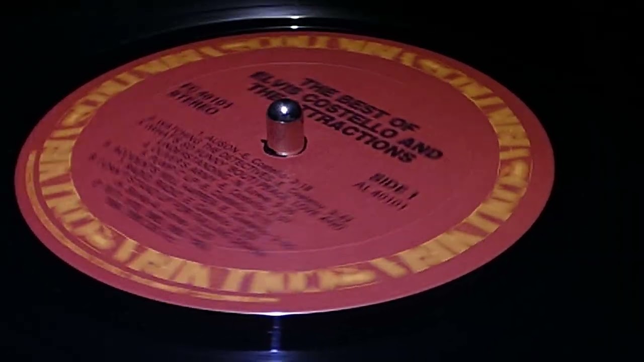 ELVIS COSTELLO AND THE ATTRACTIONS. WATCHING THE DETECTIVES.