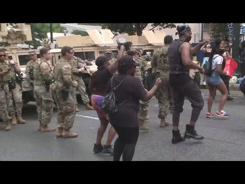 Watch: National Guard members dance with protesters in Downtown Atlanta