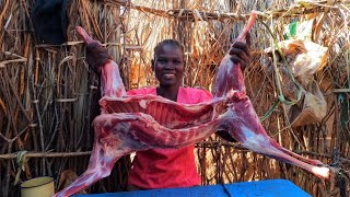 Cooking African Traditional village food/Goats meat curry with steamed bread.