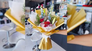 Different colour combination of flowers and paper wrapping hand Bouquet 💐