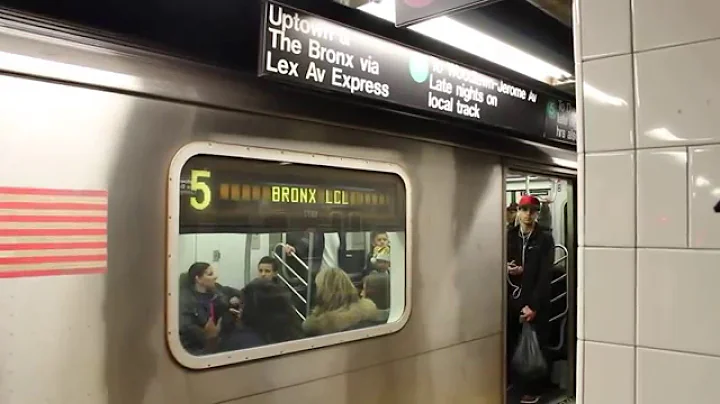 R142 (5) trains along the  Lexington Av line