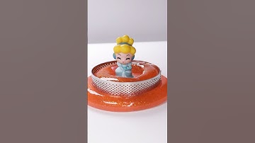 ASMR of putting an #cinderella  figure in a making slime bubble and then popping it. #satisfying
