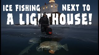 Ice fishing Lake Superior eelpout next to a lighthouse!