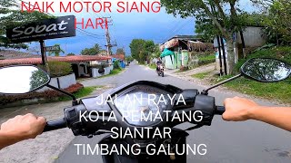 NAIK MOTOR SIANG HARI DI JALAN RAYA KOTA PEMATANG SIANTAR