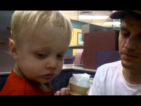 Toren licking ice cream at McDonalds