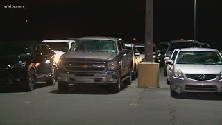 300+ cars lined up by 5:30 a.m. for food distribution in Jefferson Parish