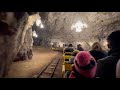 Underground narrow gauge train in a cave  postojna slovenia journey in 4k u.