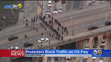 Protesters Block 110 Freeway At Wilshire In Downtown Los Angeles