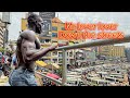 African giant walking down the streets leaving people speechless 