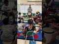 Drum circle at school. Improvisation on the djembe with a children's drum orchestra