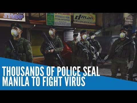 Thousands of police seal Manila to fight COVID-19