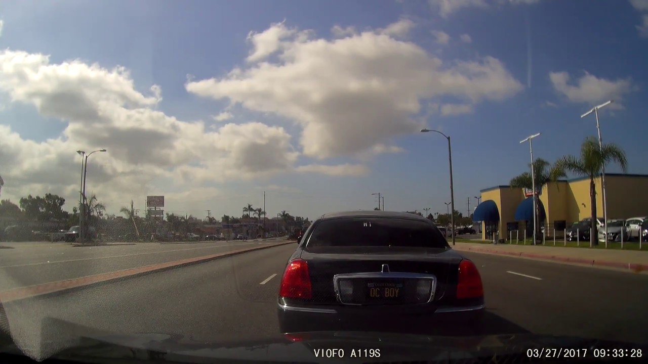 Reckless driver slamming on brakes and running a red light - YouTube