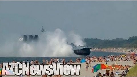 Russian Navy Hovercraft Lands On Busy Beach (PART ONE)