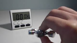 6 Drum Red Green Blue Metal Fidget Spinner Parallel to Surface Manually Twisting Spins for 2:31
