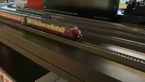 Trix 22976 with all lights on rolling at HMC