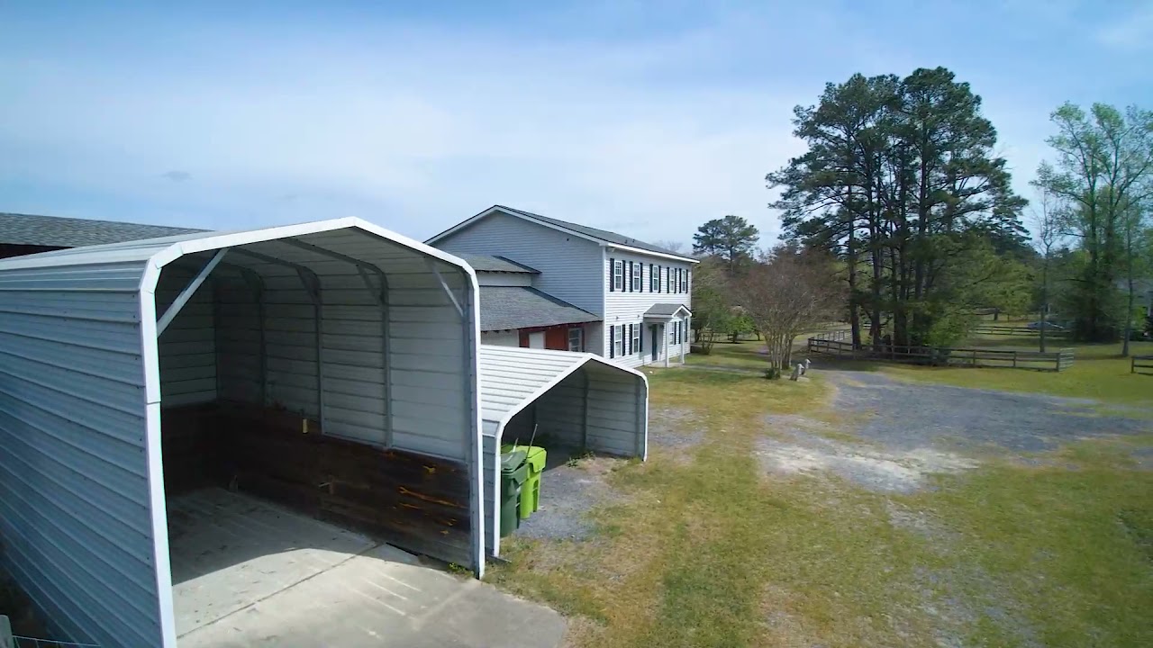 What 5 acres and a Horse barn on Back side of Lake Carolina Looks like.  Property available Today!