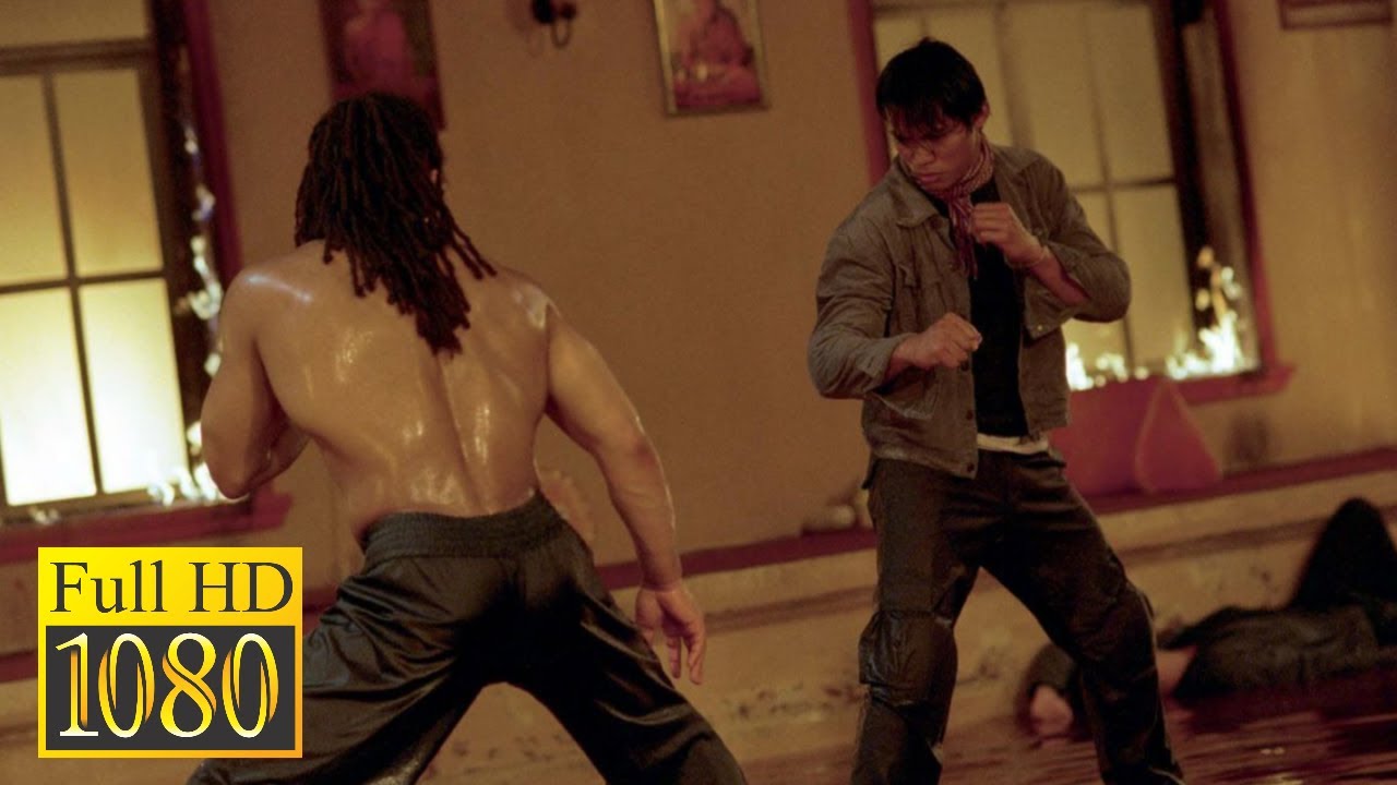 Tony Jaa fights with a Capoeira master in a Buddhist temple in the movie Tom Yum Goong 2005