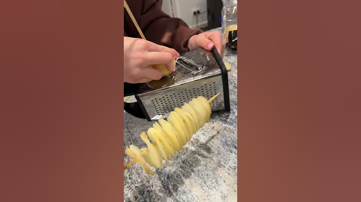 Using a Grater to Make Spiral Potatoes || ViralHog