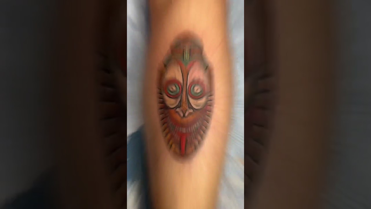Oceanic Arts tiki mask tattoo 