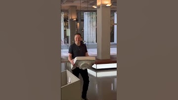 Elon Musk turns up at Twitter HQ carrying a sink