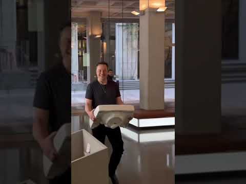 Elon Musk turns up at Twitter HQ carrying a sink