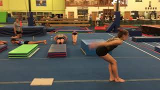 Back handspring layout step out on floor