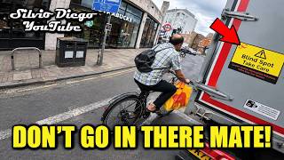Silly Cyclist Jumps the Lights Next to a Moving Truck