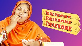Tribal Women Trying Toblerone For The First Time