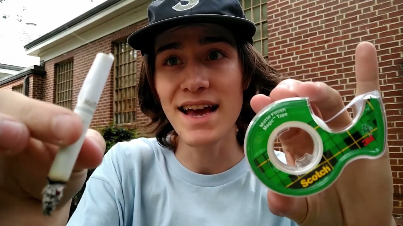 can you tape a broken cigarette Taping Cigarette's Airflow to Die Faster Broken cigarette on a wooden