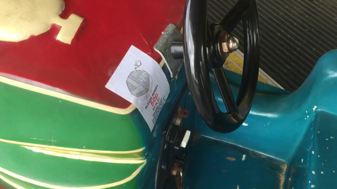 Weird Chinese Looking Tank Kiddie Ride (With Jolly Roger/Photo Me Messages)