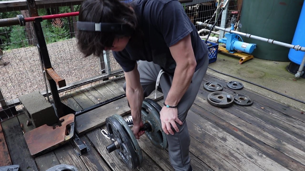 lifting heavy weight on tiny bar - YouTube