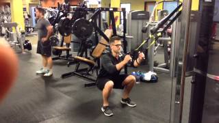 Squat Progressions:  TRX Assisted Squat