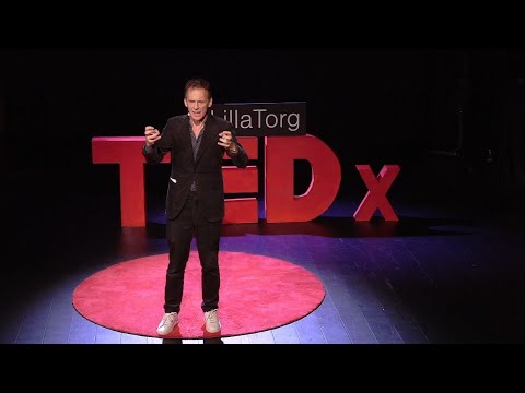 David Lagercrantz speaking on the TEDx stage in Malmö